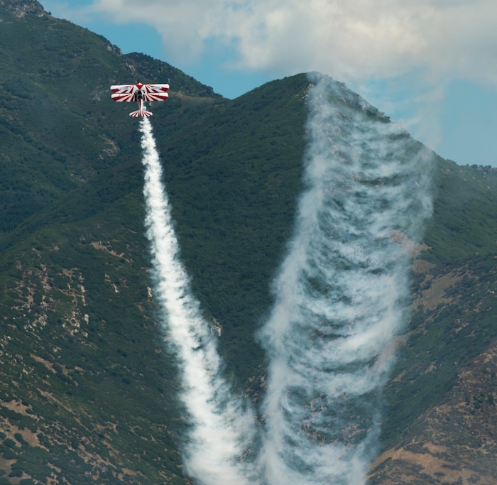 (Rick Egan  |  The Salt Lake Tribune)    Gary Rower performs in his 1941 Stearman, at the Warriors Over the Wasatch airshow at Hill Airforce Base, Sunday, June 24, 2018.