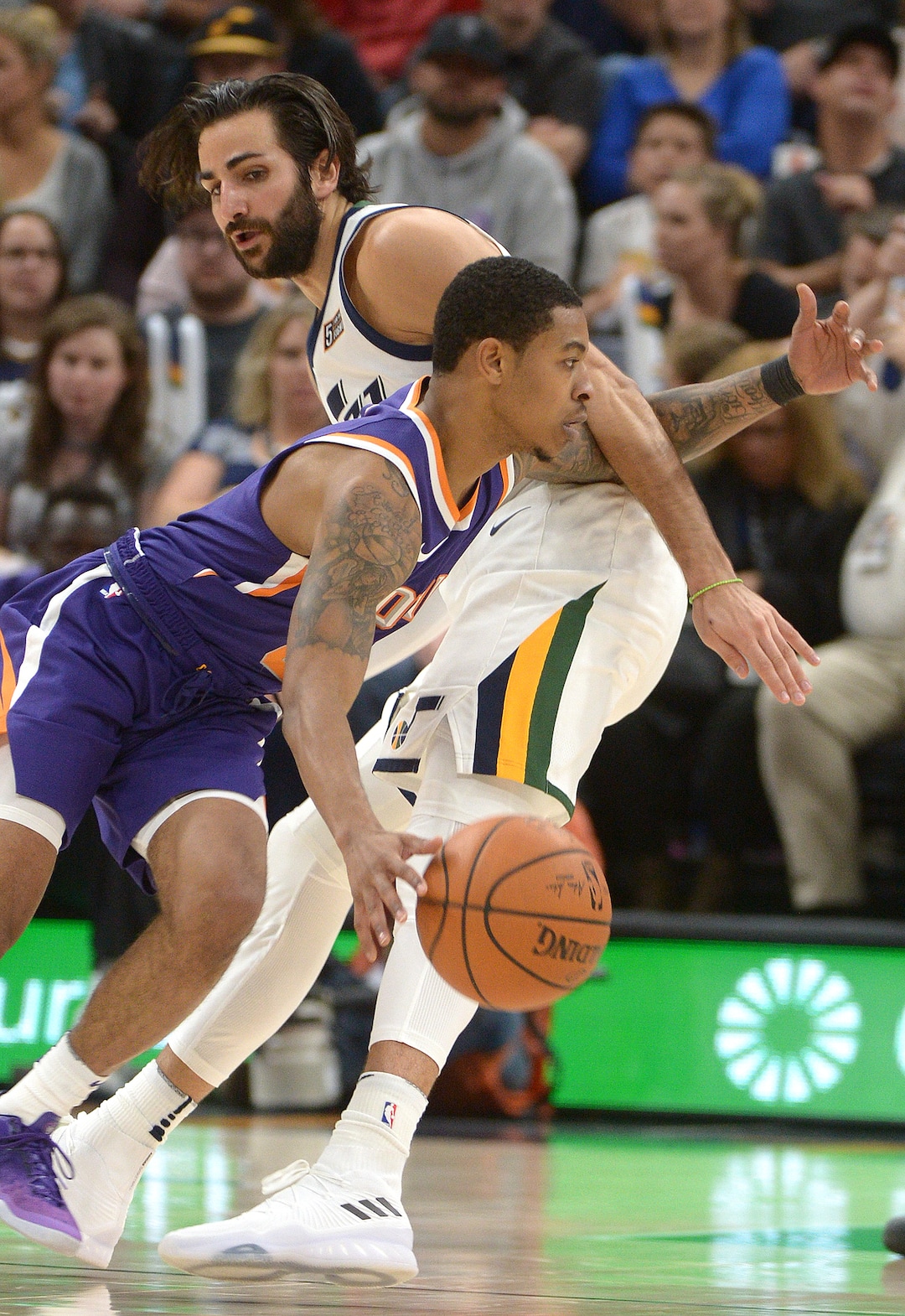 (Leah Hogsten  |  The Salt Lake Tribune) Phoenix Suns guard Tyler Ulis (8) picks up the arm of Utah Jazz guard Ricky Rubio (3).  The Utah Jazz defeated the Phoenix Suns 112-101 during preseason NBA basketball at Vivint Smart Home Arena in Salt Lake City, October 6, 2017.