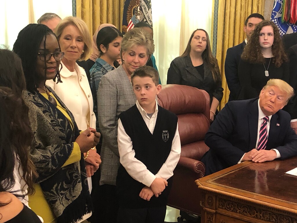 (Thomas Burr | The Salt Lake Tribune) Bountiful student William McLeod, center, participates in a White House event on prayer in public schools, in the Oval Office of the White House, Thursday, Jan. 16, 2020, in Washington. McLeod, 10, was forced by a teacher to clean his forehead on Ash Wednesday because of a misunderstanding about his Catholic faith.