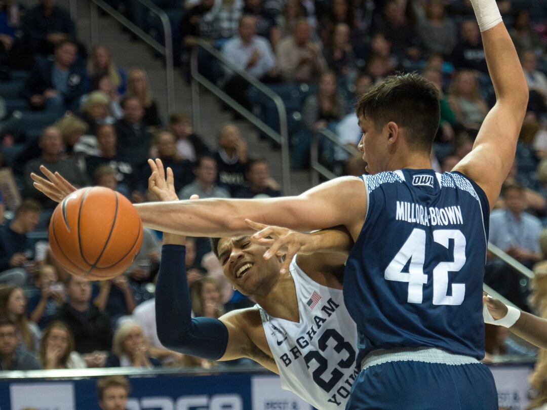 (Rick Egan  |  The Salt Lake Tribune)   Brigham Young Cougars forward Yoeli Childs (23) works for a shot, as Rice Owls forward Quentin Millora-Brown (42) defends, in basketball action between Brigham Young Cougars and Rice Owls, at the Marriott Center in Provo, Wednesday, Nov. 21, 2018.
