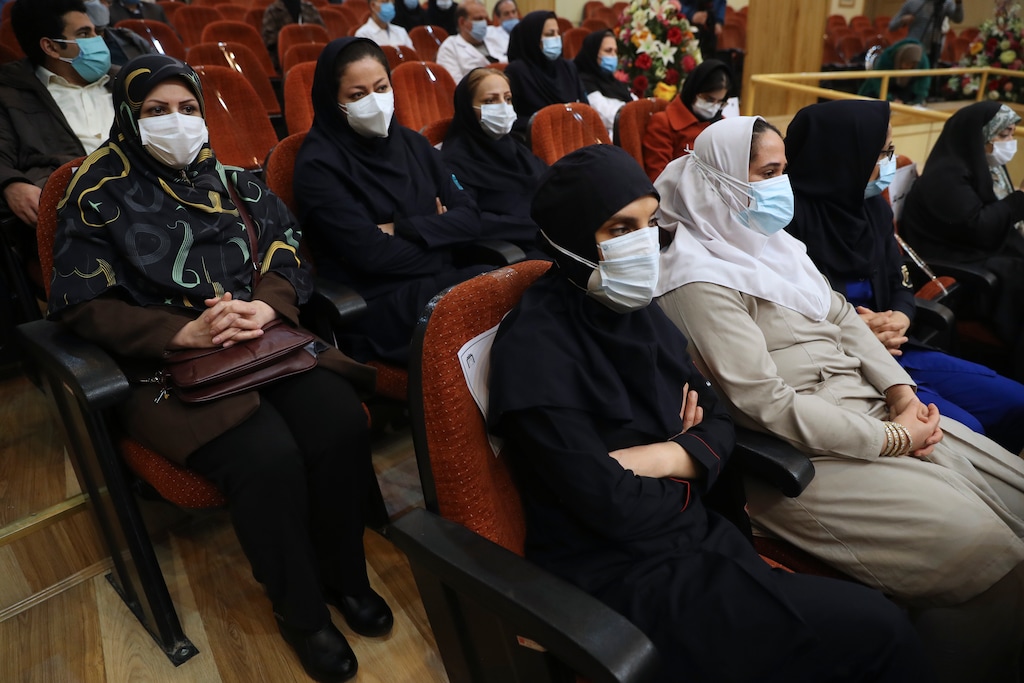 (AP Photo/Vahid Salemi)

A group of medics from the Imam Khomeini Hospital, who volunteered to receive the Russian Sputnik V coronavirus vaccine, sit prior to being injected at a staged event, in Tehran, Iran, Tuesday, Feb. 9, 2021. Iran on Tuesday launched a coronavirus inoculation campaign among healthcare professionals with recently delivered Russian Sputnik V vaccines as the country struggles to stem the worst outbreak of the pandemic in the Middle East with its death toll nearing 59,000.
