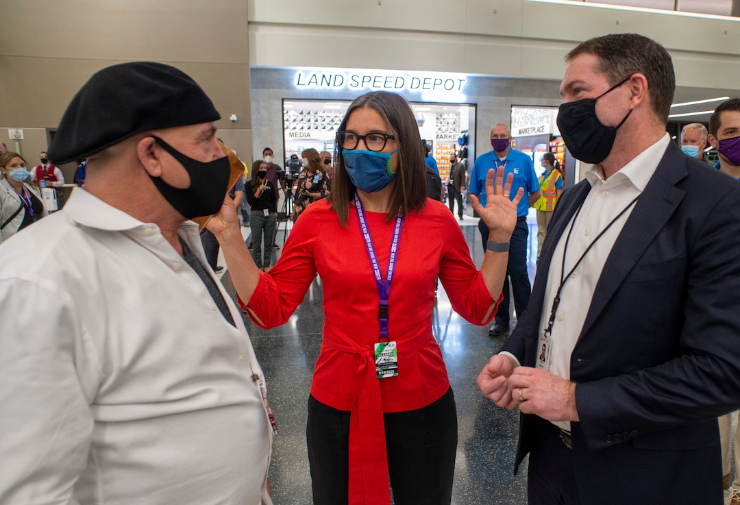 (Rick Egan  |  The Salt Lake Tribune)    Artist Gordon Huether visits with Salt Lake City Mayor Erin Mendenhall, and Eric Phillips, Senior Vice President of Airport Customer Service and Cargo for Delta Air Lines and cut the ribbon at the opening of the new terminal at the Salt Lake City International Airport on Tuesday, Sept. 15, 2020.