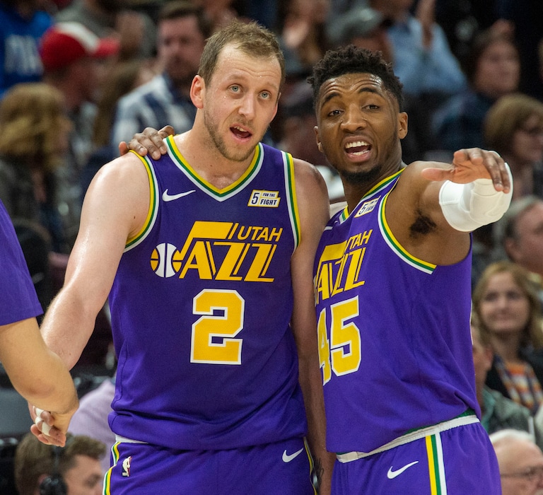 (Rick Egan  |  The Salt Lake Tribune)        Utah Jazz forward Joe Ingles (2) talks with Utah Jazz guard Donovan Mitchell (45) during a break in the action, in NBA action the Utah Jazz and the Washington Wizards, in Salt Lake City, Friday, March 29, 2019.