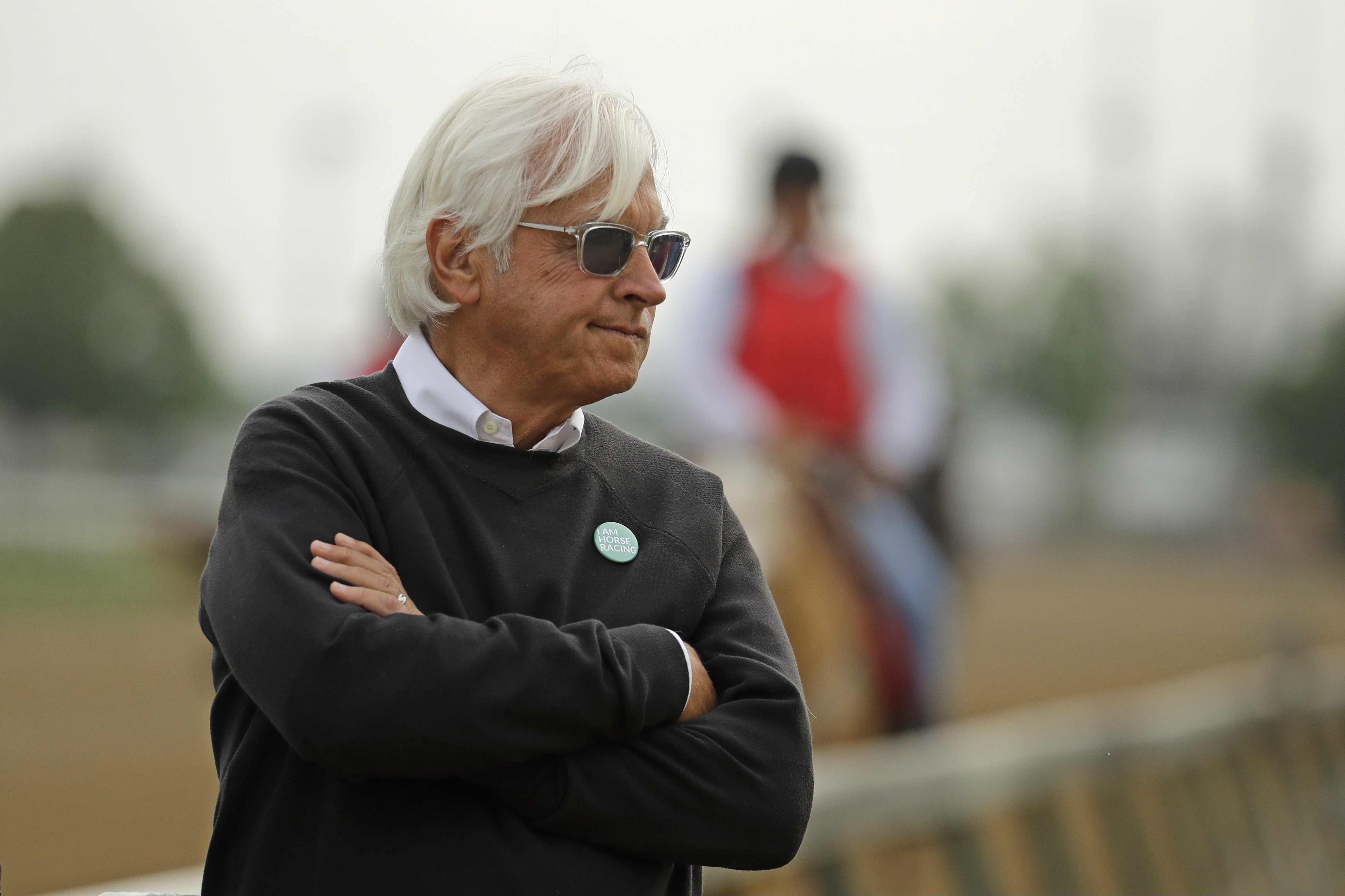 (Charlie Riedel | AP) Trainer Bob Baffert watches his Kentucky Derby entrant Game Winner during a workout at Churchill Downs in Louisville, Ky., May 1, 2019. Baffert was suspended for two years by Churchill Downs on Wednesday, June 2, 2021, after an additional drug test of Medina Spirit confirmed the presence of the steroid betamethasone in the Kentucky Derby winner’s system.