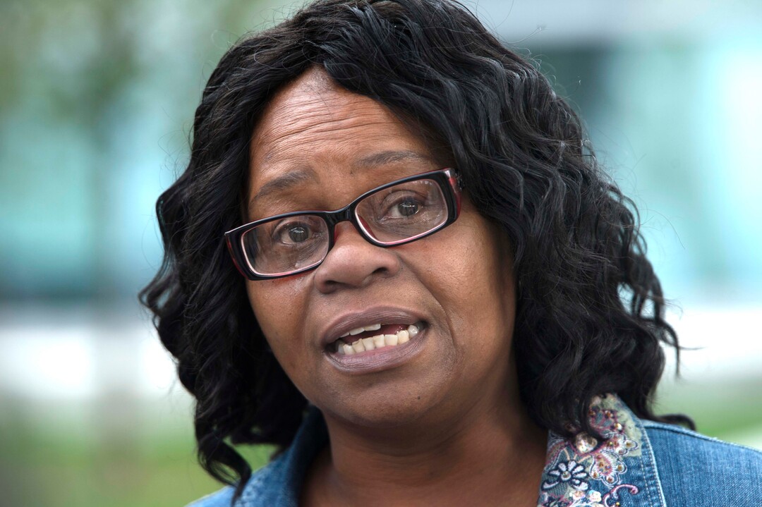 (Rick Egan  |  The Salt Lake Tribune)  Antonette Harmon, the sister of Patrick Harmon, talk about her brother, at the Black Lives Matterprotest against police brutality. The protesters are calling for the release of body camera footage of an officer fatally shooting 50-year-old Patrick Harmon at the Salt Lake City Public Safety Building, Saturday, September 30, 2017.
