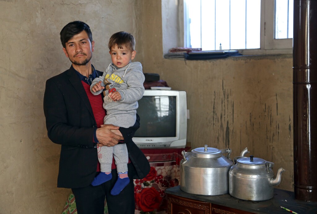 (Rahmat Gul | The Associated Press) Asadullah Poya with his 18-month-old son Donald Trump, poses for a photograph at their rented house in Kabul, Afghanistan, Thursday, March 15, 2018. Poya, from a small, rural village, named his newborn son Donald Trump, hoping it would bring the boy good fortune. It hasn’t. Relatives and neighbors were furious that he broke with tradition and gave his son a non-Muslim name. He was forced to move his family to Kabul, and they’ve received death threats online.
