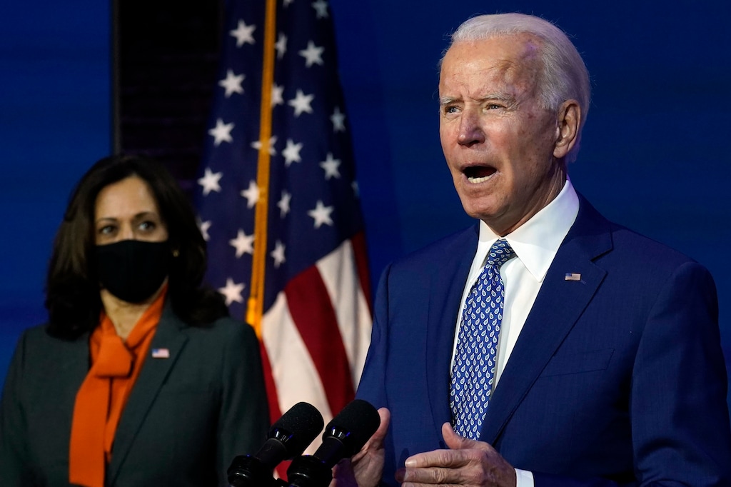 (Carolyn Kaster | AP)  President-elect Joe Biden, joined by Vice President-elect Kamala Harris, speaks at The Queen theater, Monday, Nov. 9, 2020, in Wilmington, Del.