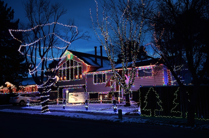 (Scott Sommerdorf | The Salt Lake Tribune)
A view of some of the houses on Royalwood Drive in Taylorsville, Friday, December 22, 2017. "Christmas Street" is a Taylorsville neighborhood where residents up and down the street decorate their homes every year with Christmas lights. The United States uses more electricity for Christmas lights than some countries use all year.