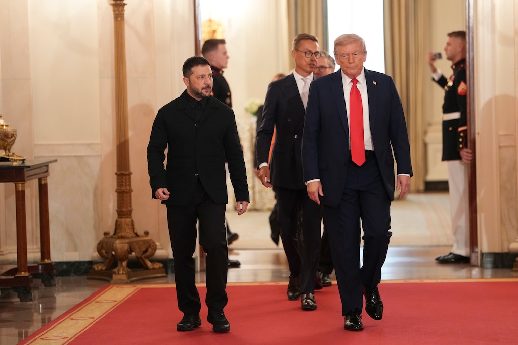 (Doug Mills | The New York Times) President Donald Trump walks with President Volodymyr Zelenskyy of Ukraine at the White House in Washington, on Monday, Aug. 18, 2025.