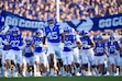 (Francisco Kjolseth | The Salt Lake Tribune) BYU players run onto the field for their NCAA college football game against Utah Tech, Saturday, Sept. 5, 2026, at LaVell Edwards Stadium in Provo.