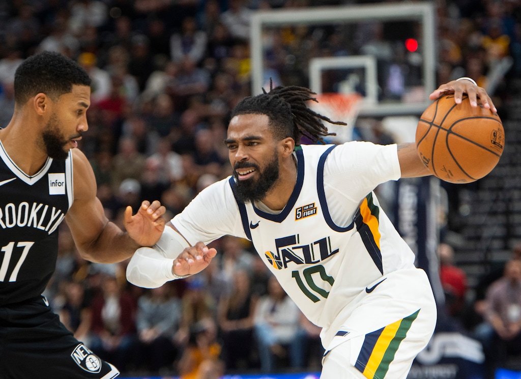(Rick Egan  |  The Salt Lake Tribune)        Utah Jazz guard Mike Conley (10) drives inside with the ball, as Brooklyn Nets guard Garrett Temple (17) defends, in NBA basketball action between the Utah Jazz and the Brooklyn Nets in Salt Lake City, Tuesday, Nov 12, 2019.