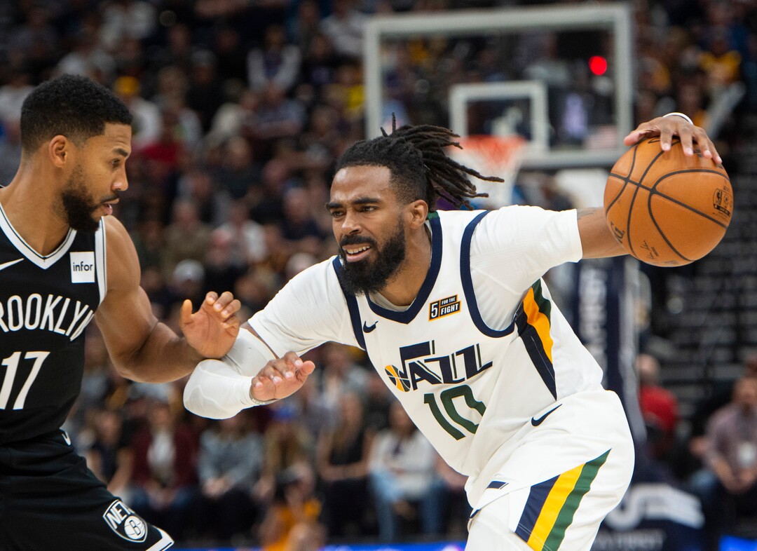 (Rick Egan  |  The Salt Lake Tribune)        Utah Jazz guard Mike Conley (10) drives inside with the ball, as Brooklyn Nets guard Garrett Temple (17) defends, in NBA basketball action between the Utah Jazz and the Brooklyn Nets in Salt Lake City, Tuesday, Nov 12, 2019.