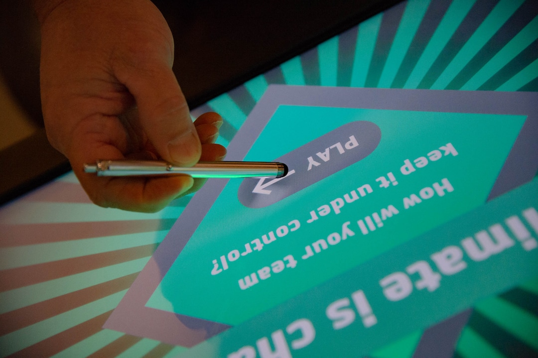 (Francisco Kjolseth  |  The Salt Lake Tribune) Mark Ingalls, IT Manager for the Museum of Natural History uses a stylus to interact with the digital displays at the museum. The price of admission will provide visitors with a stylus as he talks about updates that have been made to hopefully reopen the museum in mid-August.