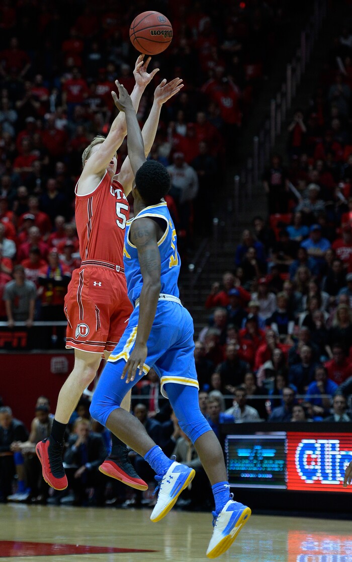 (Francisco Kjolseth  |  The Salt Lake Tribune)  Utah Utes guard Parker Van Dyke (5) launches a critical three pointer at the end of the game as the University of Utah hosts UCLA in NCAA basketball at the Huntsman Center in Salt Lake City, Thursday, Feb. 22, 2018.