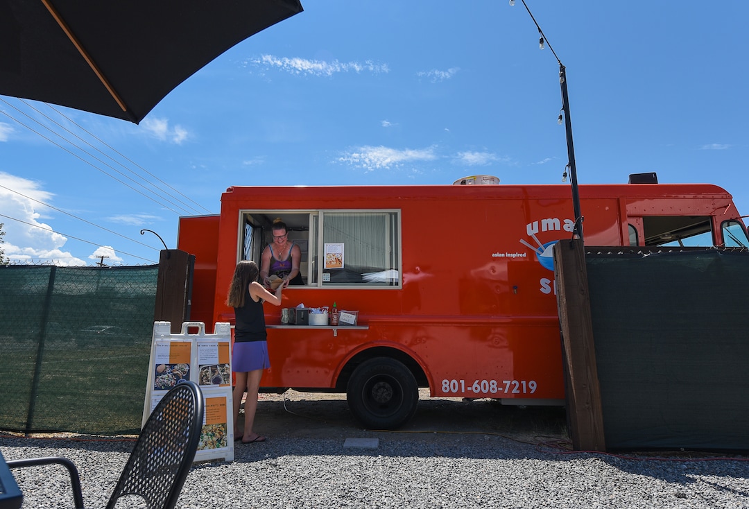 (Francisco Kjolseth  |  The Salt Lake Tribune)  The Umai food truck serves Asian street food including a sliders and tacos.