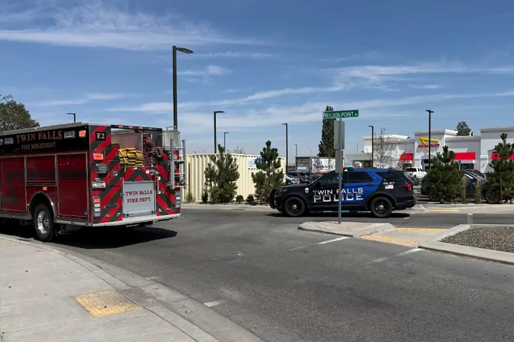 Police and fire crews respond at an In-N-Out Burger restaurant in Twin Falls, Idaho, on Saturday after a shooting that left at least three people dead.Credit...