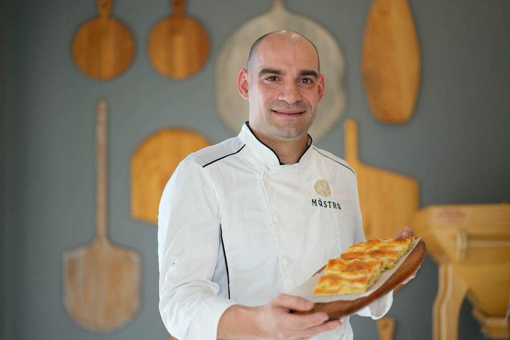 (Francisco Kjolseth  |  The Salt Lake Tribune) Chef and owner Jonathan Cagnacci of Mastra Italian Bakery Bistro in American Fork is photographed with his authentic focaccia on Thursday, Nov. 9, 2023.