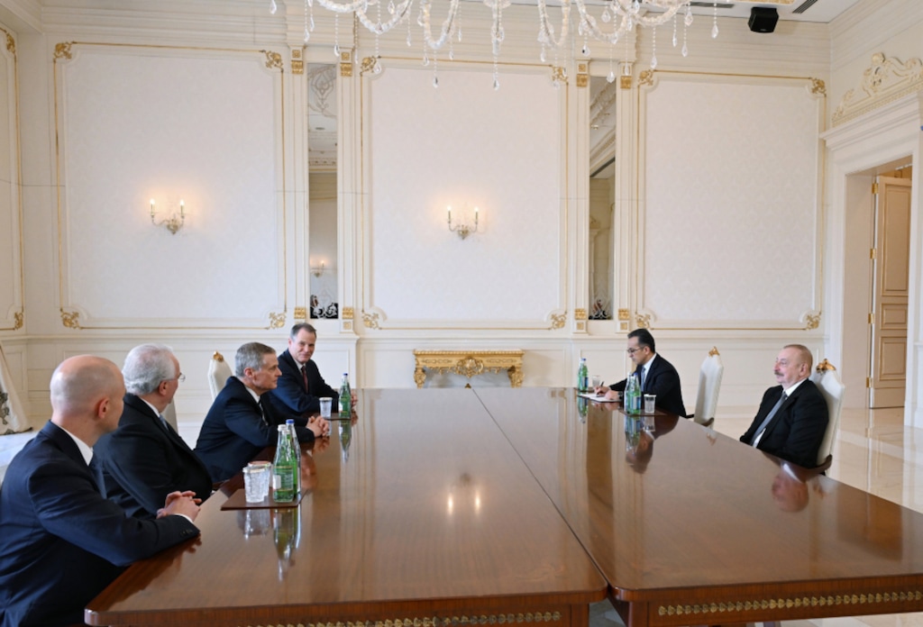 (State Committee on Affairs with Religious Associations of the Republic of Azerbaijan) A high-level meeting Latter-day Saint apostle David A. Bednar middle left, Azerbaijan President Ilham Aliyev, middle right, on April 30, 2024.