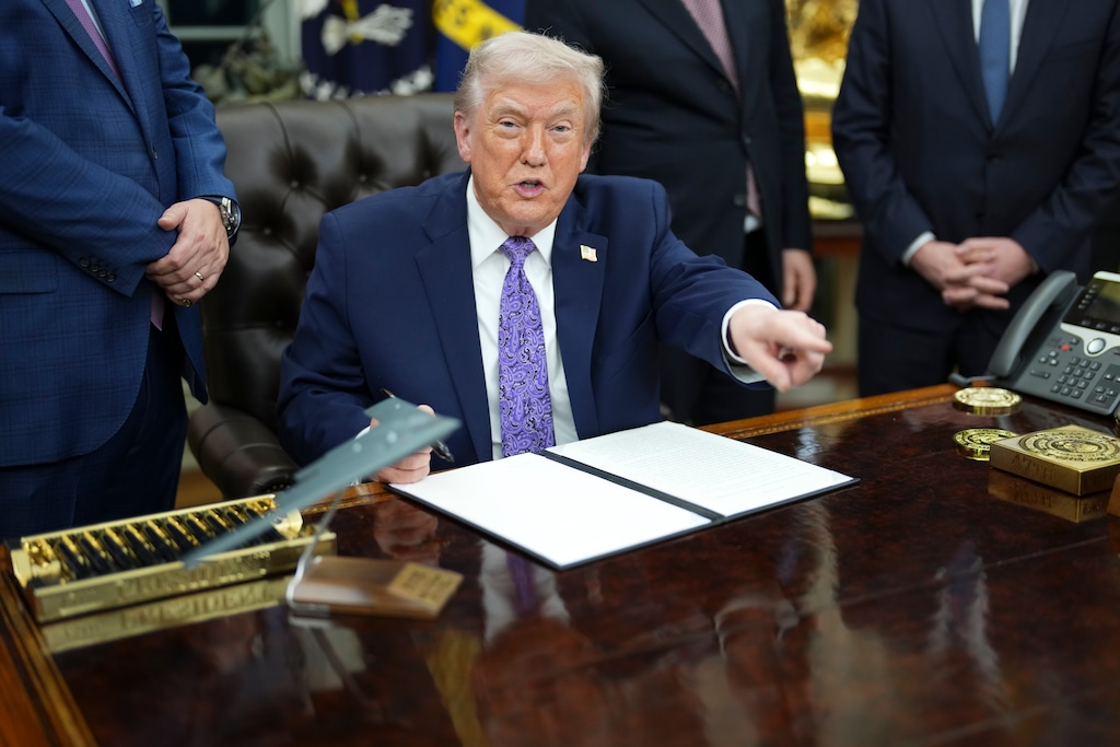 (Doug Mills | The New York Times) President Donald Trump speaks during an executive order signing event in the Oval Office of the White House in Washington, on Thursday, Dec. 11, 2025.