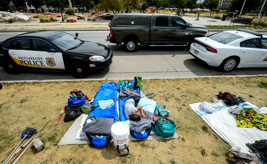 (Steve Griffin  |  The Salt Lake Tribune)  Law enforcement officers from several agencies increase their presence in the Rio Grand homeless area in Salt Lake City Monday August 14, 2017.