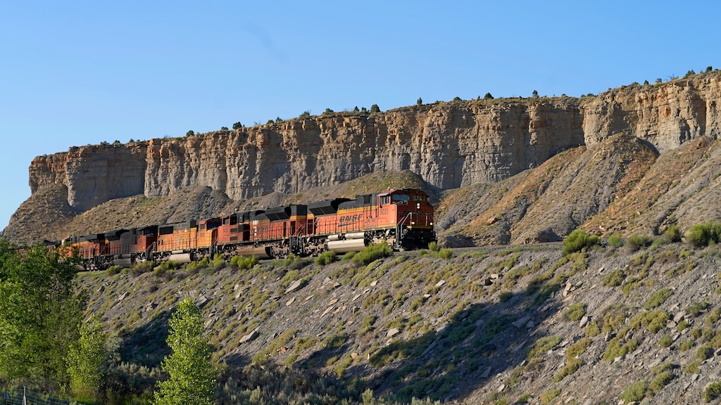 (Rick Bowmer | The Associated Press) A train transports freight on a common carrier line near Price, Utah on Thursday, July 13, 2023. 
