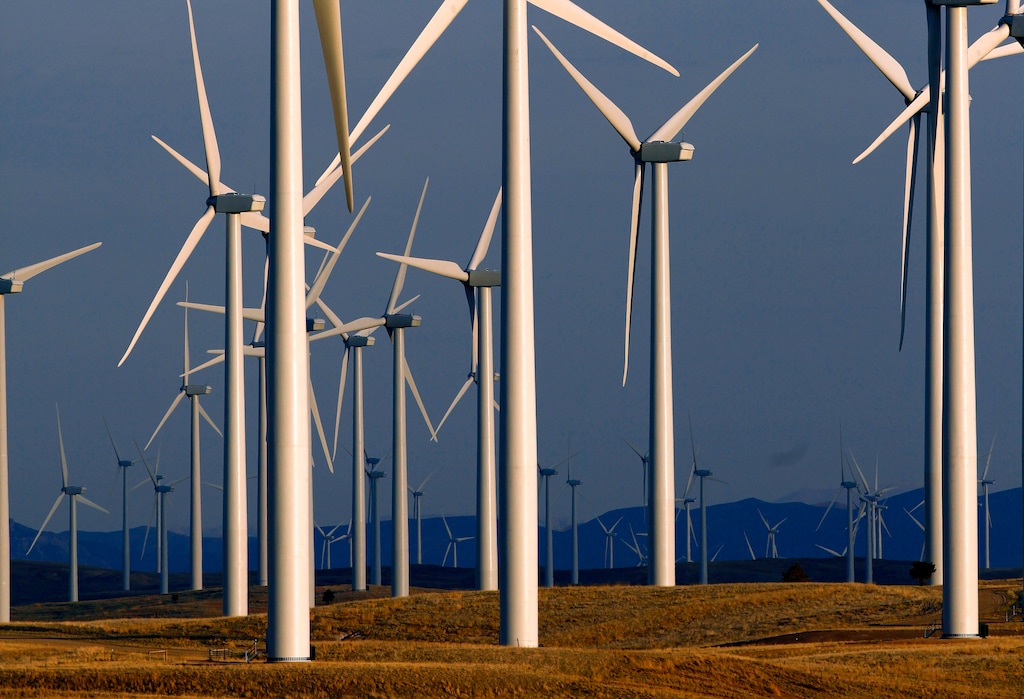 FILE - This May 6, 2013 file photo shows a wind turbine farm owned by PacifiCorp near Glenrock, Wyo. (AP Photo/Matt Young)