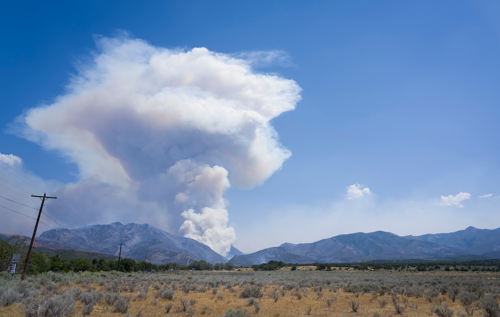 (Bethany Baker  |  The Salt Lake Tribune) Smoke from the Widemouth 2 Fire is seen from Fillmore on Thursday, Aug. 6, the day before a pair of pilots operating a helicopter working to fight the fire fatally crashed.
