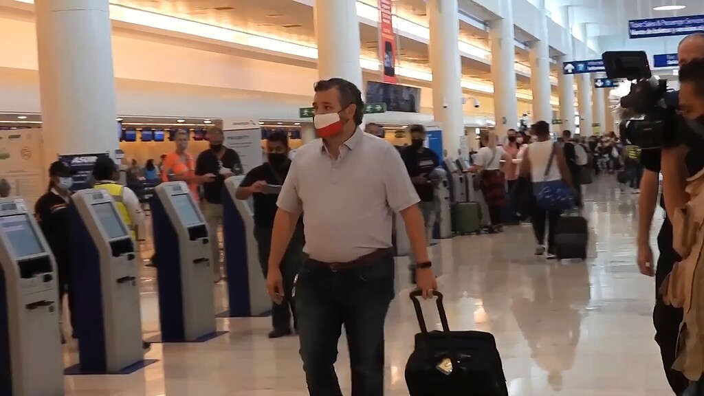 (Dan Christian Rojas | AP photo)

In this image from video, Sen. Ted Cruz, R-Texas, walks to check in for his flight back to the U.S., at Cancun International Airport in Cancun, Mexico, Thursday, Feb. 18, 2021.
