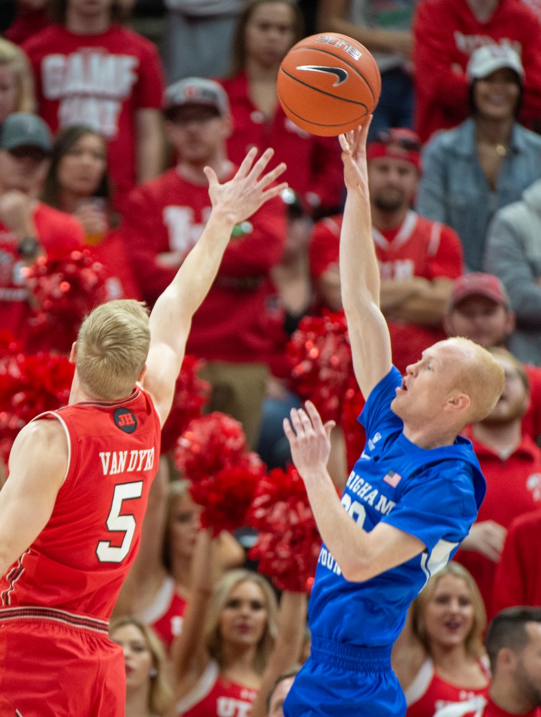 (Rick Egan  |  The Salt Lake Tribune)   against the Brigham Young Cougars guard TJ Haws, (30) shoots over Utah Utes guard Parker Van Dyke (5), in basketball action in the Beehive Classic, between against the Brigham Young Cougars and Utah Utes, at the Vivint Smart Home Arena, Saturday December 8, 2018.