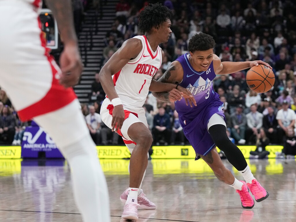 (Bethany Baker |AP) Utah Jazz guard Keyonte George (3) dribbles past Houston Rockets forward Amen Thompson (1) during the first half of an NBA basketball game Saturday, Feb. 22, 2025, in Salt Lake City