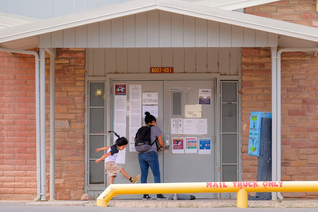 (Leah Hogsten  |  The Salt Lake Tribune) A Navajo Mountain Chapter House worker locks up after a food distribution drive, Aug., 25, 2020. Earlier this year, Navajo Mountain was one of Utah's coronavirus hotspots.