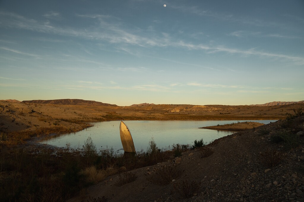 (Erin Schaff | The New York Times) 

A broken boat that used to be under water in Lake Mead now sits above the lake’s water line because of a decades-long megadrought outside of Boulder City, NV, earlier this month.