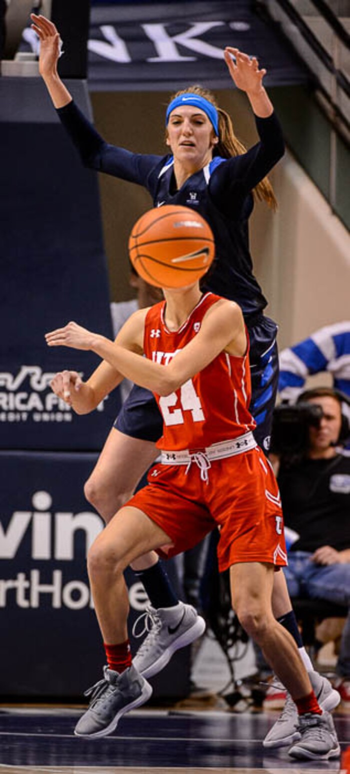 (Trent Nelson | The Salt Lake Tribune)  Brigham Young Cougars center Sara Hamson (22) defends Utah Utes guard/forward Tilar Clark (24) as BYU hosts Utah, NCAA women's basketball in Provo, Saturday December 9, 2017.