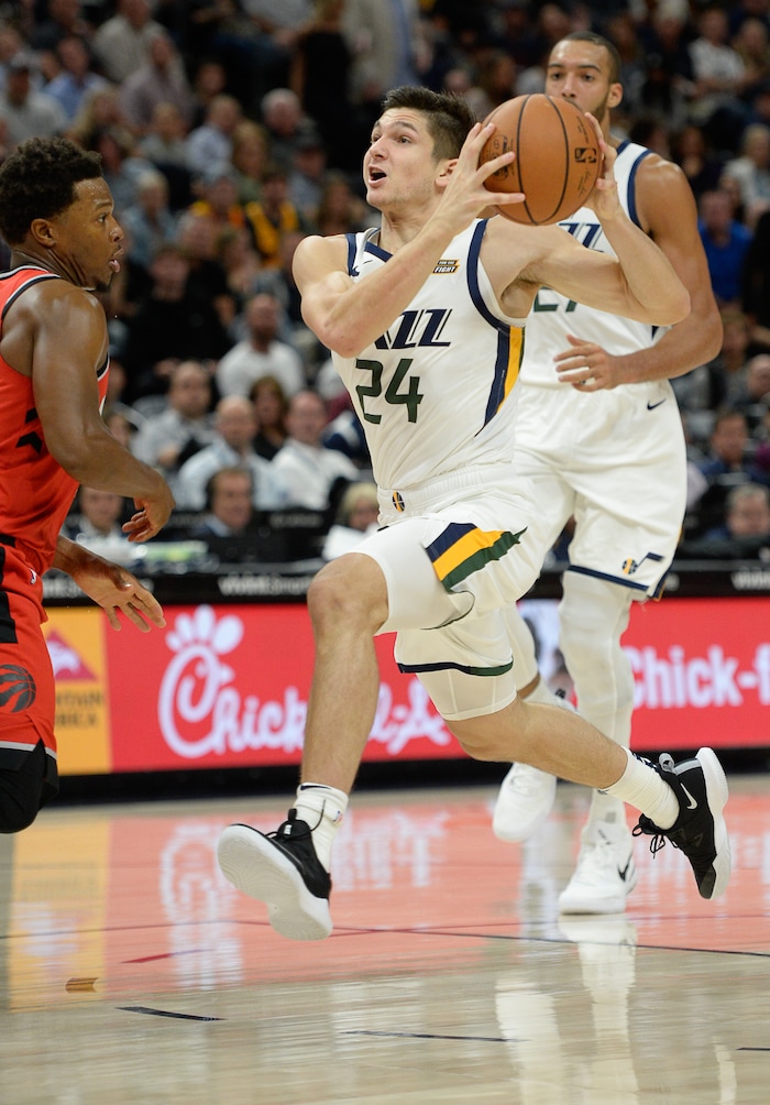(Francisco Kjolseth  |  The Salt Lake Tribune)  Utah Jazz guard Grayson Allen (24) drives the ball against the Raptors in the first half of the preseason NBA game at Vivint Smart Home Arena Tuesday, Oct. 2, 2018, in Salt Lake City.