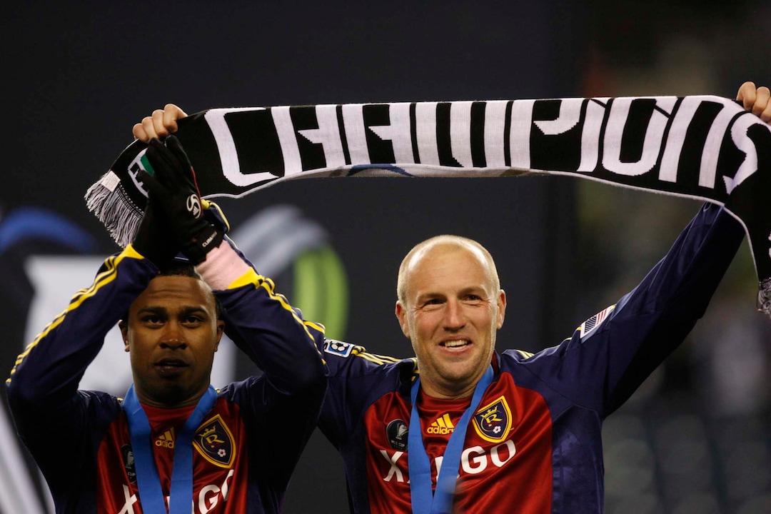 (Trent Nelson  |  Tribune file photo) Real Salt Lake forward Robbie Findley (10) and midfielder Clint Mathis (84) celebrate the team's victory. RSL won the cup 5-4 during the penalty round.