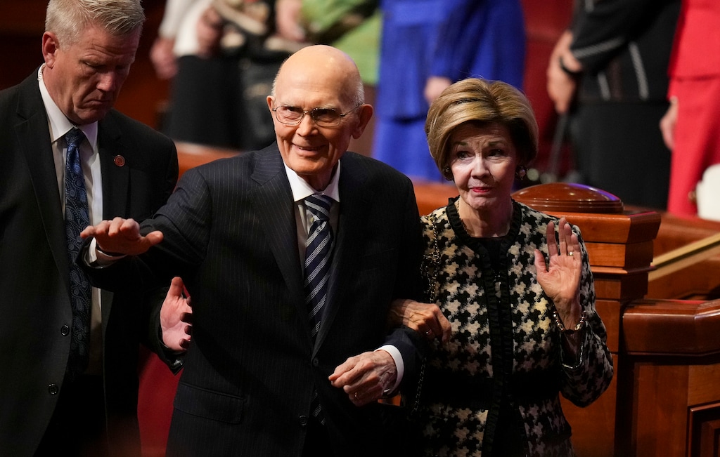 (Bethany Baker  |  The Salt Lake Tribune) President Dallin H. Oaks, left, waves along with his wife, Kristen Oaks, as they exit after the first session of General Conference of The Church of Jesus Christ of Latter-day Saints at the Conference Center in Salt Lake City, on Saturday, Oct. 4, 2025.