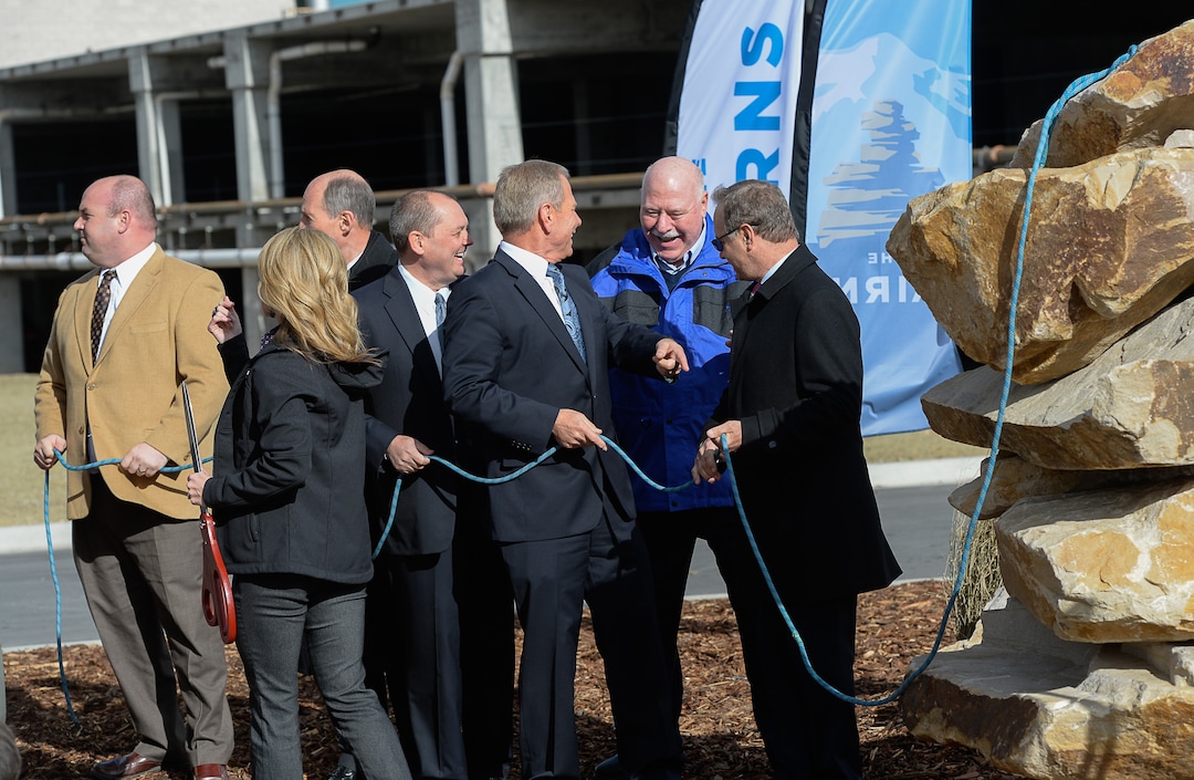 Francisco Kjolseth  |  The Salt Lake TribuneSandy officials, including Mayor Tom Dolan, second from right, hold a "climbing rope" cutting event at the site of the future Prestige, a 25-story high-rise residential building in the heart of a new 1,100 acre city center called "The Cairns." The project from 90th S. to 114th S., and I-15 to UTA light rail calls for 20 million square feet of development.