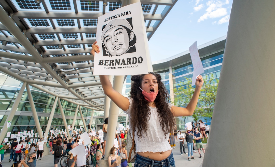 (Rick Egan  |  The Salt Lake Tribune)    Angelique Wallace joins protesters at the Salt Lake Public Safety Building during a Justice for Bernardo protest on Wednesday, June 24, 2020.