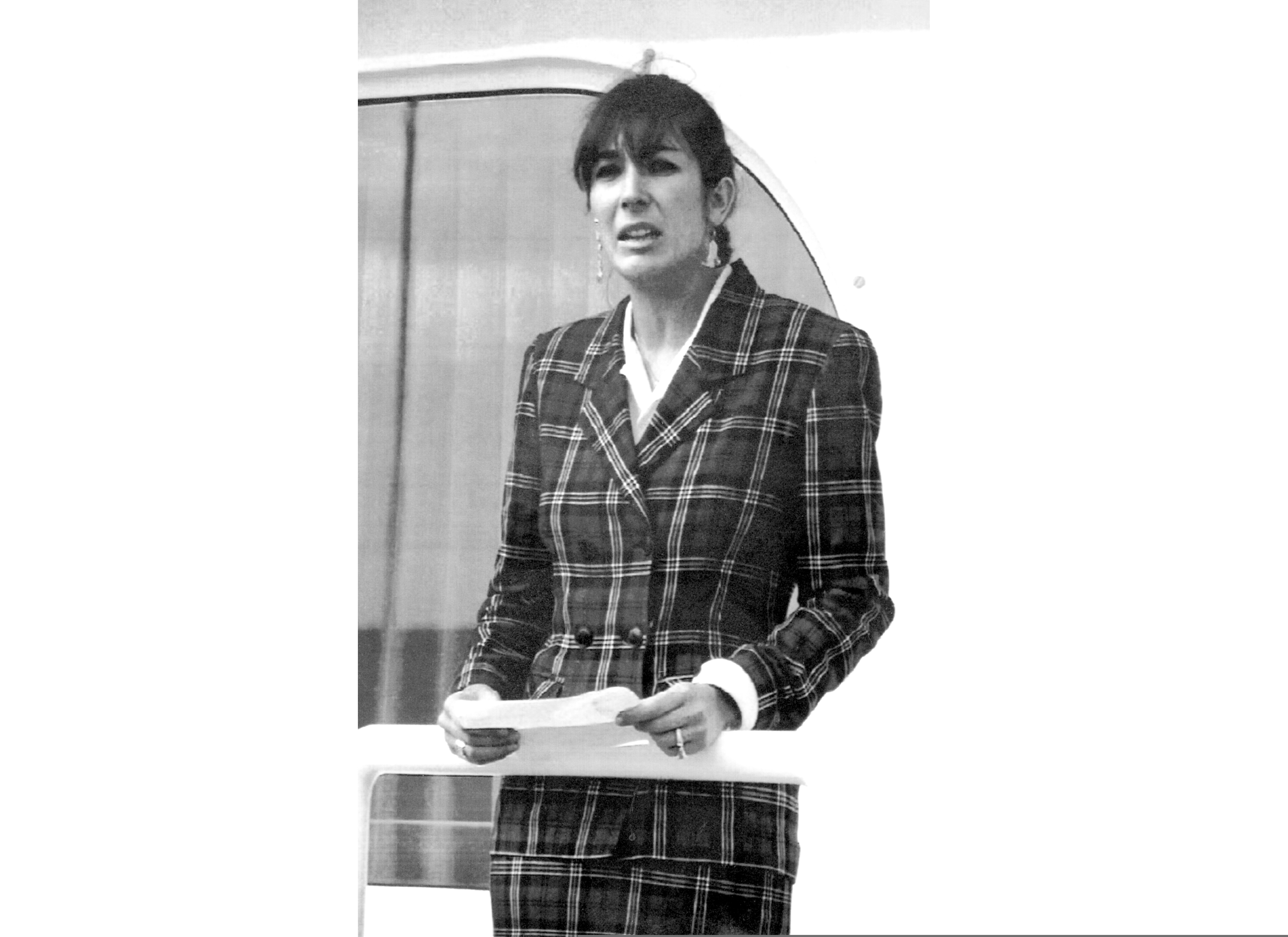 (Dominique Mollard | AP) In this Nov. 7, 1991, file photo Ghislaine Maxwell, daughter of late British publisher Robert Maxwell, reads a statement in Spanish in which she expressed her family's gratitude to the Spanish authorities, aboard the "Lady Ghislaine" in Santa Cruz de Tenerife. Maxwell, a British socialite who was accused by many women of helping procure underage sex partners for Jeffrey Epstein, has been arrested in New Hampshire, the FBI said Thursday, July 2, 2020.