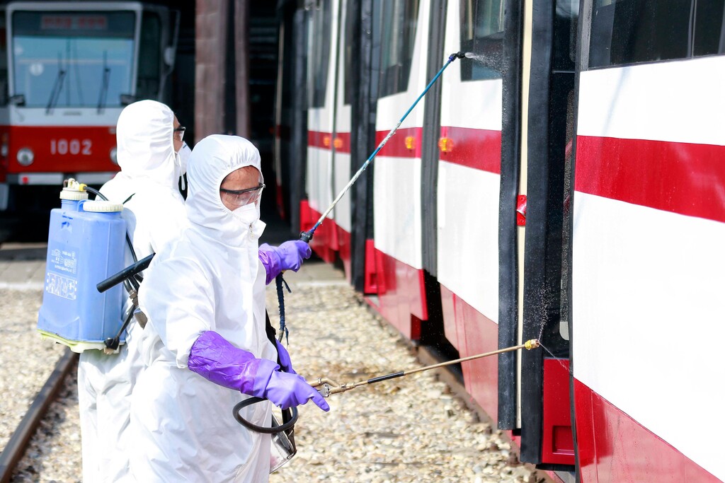 (Jon Chol Jin | AP file photo) In this Feb. 26, 2020, file photo, members from an emergency anti-epidemic headquarters in Mangyongdae District, disinfect a tramcar of Songsan Tram Station to prevent new coronavirus infection in Pyongyang, North Korea.