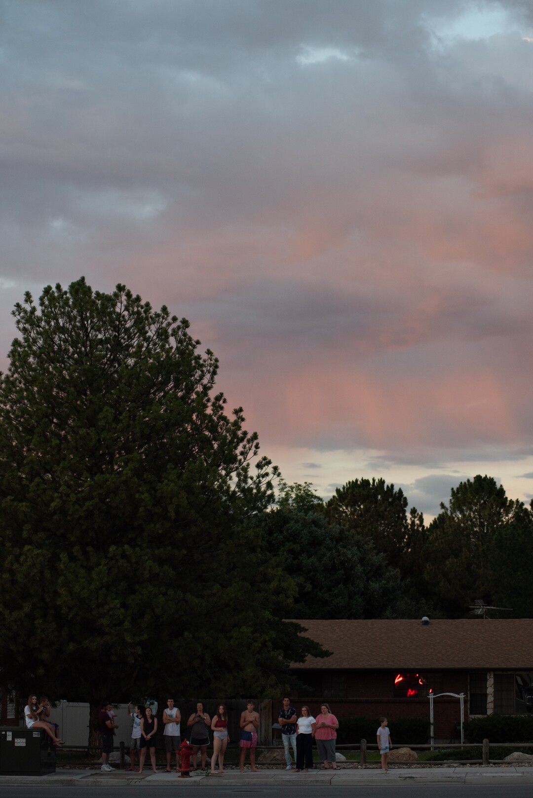 (Niki Chan Wylie for The Salt Lake Tribune) A neighborhood crowd waits to see the blast in South Jordan on Friday, July 24.