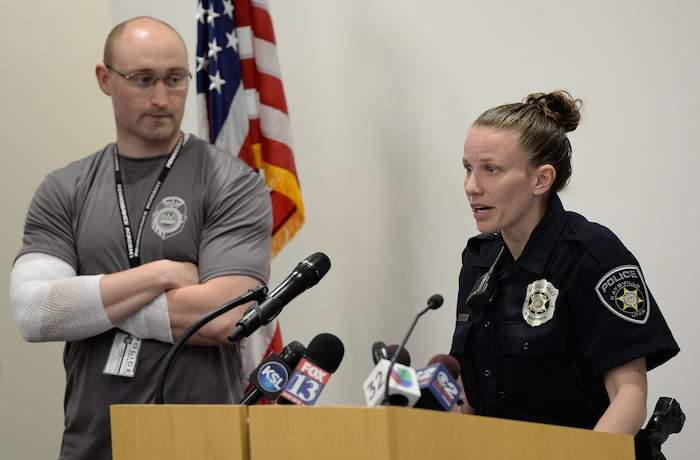 (Francisco Kjolseth  |  The Salt Lake Tribune)  Kaysville officers Cade Bradshaw and Lacy Turner describe the events and injuries sustained during on a call earlier this month during a press event on Thursday, April 12, 2018. Four officers were injured on April 5, 2018, when responding to a suicidal man at a Chevron gas station store who had doused himself with gasoline. As the officers tried to get a lighter from the manÕs hand, the man lit himself on fire.