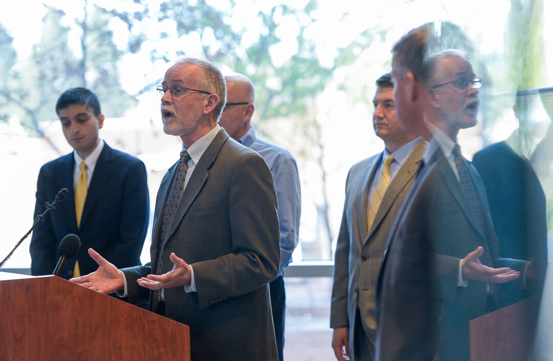 (Francisco Kjolseth  |  The Salt Lake Tribune)  Kobus Van der Merwe, center left, associate professor in the University of Utah's School of Computing and co-director of the school's Flux Research Group, leads the team that will build a wireless-technology "testbed" in Downtown Salt Lake City  for the next generation of wireless technology. Researchers will be able to test the next generation of wireless devices, from high-speed transfers to self driving cars. 