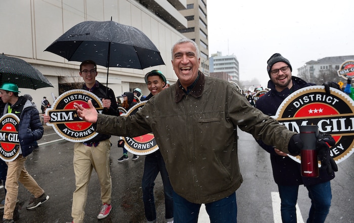 (Scott Sommerdorf | The Salt Lake Tribune) Salt Lake County District Attorney Sim Gill marches with his group during the 40th annual Salt Lake City St. Patrick's Day Parade on Saturday, March 17, 2018.