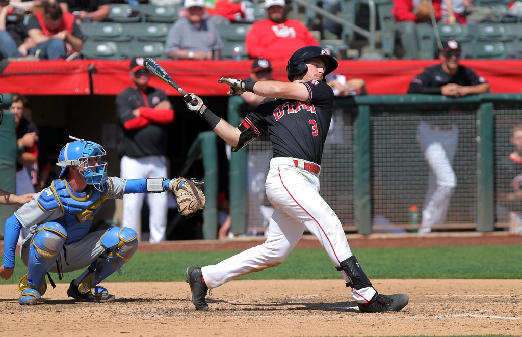 (Photo  courtesy of Steve C. Wilson/ University of Utah). Utah infielder Oliver Dunn swings vs. UCLA in 2018.