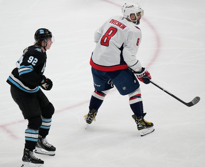 (Francisco Kjolseth | The Salt Lake Tribune) Utah Hockey Club center Logan Cooley (92) skates alongside Washington Capitals left wing Alex Ovechkin (8) during an NHL hockey game at the Delta Center in Salt Lake City on Monday, Nov. 18, 2024.