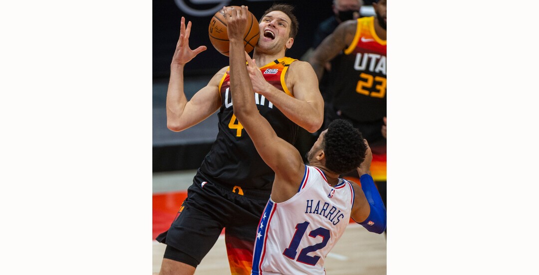 (Rick Egan | The Salt Lake Tribune) Utah Jazz forward Bojan Bogdanovic (44) is fouled by Philadelphia 76ers forward Tobias Harris (12) but still manages to get the ball in the hoop, in NBA action between the Utah Jazz and the Philadelphia 76ers at Vivint Arena, on Monday, Feb. 15, 2021.