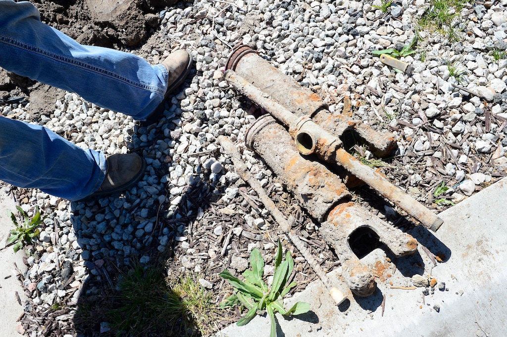 (Scott Sommerdorf | The Salt Lake Tribune)
The older connections that come out in order to install Weber Basin water district's secondary water meters. The new meters were installed on a street in Westhaven today as part of a program to reduce water waste in their area, Thursday, April 26, 2018.