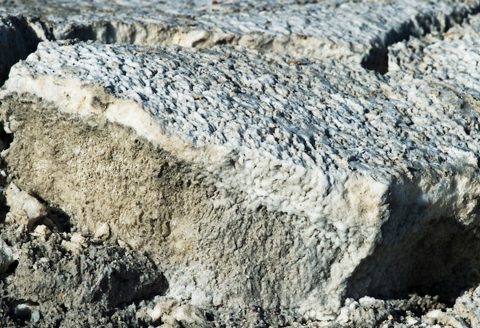 (Steve Griffin / Tribune file photo)   Salt crumbles away at the end of the road at Bonneville Salt Flats International Speedway, seen here in January 2017.