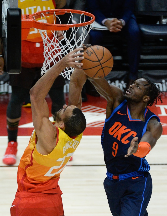 (Francisco Kjolseth  |  The Salt Lake Tribune)   Utah Jazz center Rudy Gobert (27) battles Oklahoma City Thunder forward Jerami Grant (9) in the NBA game at Vivint Smart Home Arena Sat., Dec. 22, 2018, in Salt Lake City.